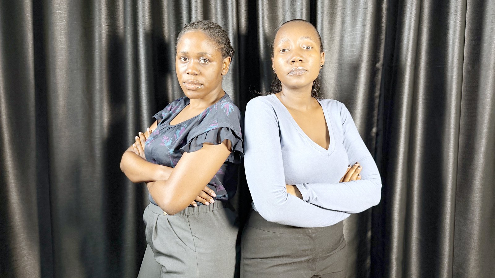 Two members of the Kontext Media team